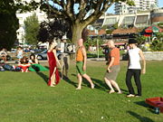 A troupe of street theatre performers by the beach in Vancouver,great Canada.