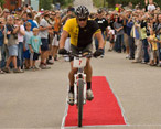 Lance Armstrong nears the finish line of the Leadville Trail 100 Race Across the Sky. Photograph by Rob O'Dea.