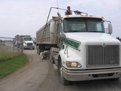 Protesters lock down to delivery truck