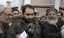 shakeel Ahmad, husband of Nelofar and Brother of Asiya setting Ablaze the copy of (CBI) findings in shopian rape and murder case to protest against alleged cover up by the investigating agency. In Srinagar on 14, December 2009.