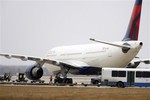 Northwest Airlines flight 253 sits on the tarmac after requesting emergency help at Detroit Metropolitan Airport in Romulus, Mich., Sunday, Dec. 27, 2009.