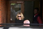 U.S. singer Madonna departs from the High Court in Lilongwe, Malawi Monday