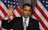 President Barack Obama finishes his speech at a Democratic National Committee fundraiser at the National Women in the Arts Museum in Washingto