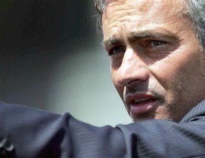 Inter of Milan coach Jose Mourinho, of Portugal, looks on prior to the start of the Italian Serie A soccer match between Cagliari and Inter of Milan, in Cagliari, Italy, Sunday, May 24, 2009.