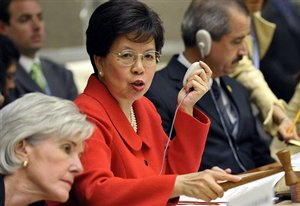 China's Margaret Chan, center, Director General of the World Health Organization (WHO), speaks next to US Health and Human Services Secretary Kathleen Sebelius, left, and Mexican Health Minister Jose Angel Cordova Villalobos, right, during a high-level consultation during the first day of the 62nd World Health Assembly, WHA, at the European headquarters of the United Nations, UN, in Geneva, Switzerland, Monday, May 18, 2009. Swine flu and the possibility of a vaccine topped the agenda Monday as the World Health Organization opened its annual meeting amid concern that the virus continues to spread _ and kill _ around the globe