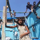 Rubina Ali with her damaged shack