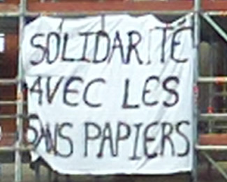 Banner drop - in solidarity for those without papers