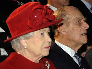 Britain's Queen Elizabeth II and Prince Philip watch a dance performance, during the opening ceremonies of Paragon House at Thames valley University in west London, Friday Feb. 20, 2009.