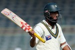 Pakistan's batsman Mohammad Yousaf acknowledges his fans during the third and final test against West Indies, Thursday, Nov. 30, 2006, at National stadium in Karachi, Pakistan. Master batsman Mohammad Yousuf broke the 30-year-old world record of most test runs in a calendar year with his ninth century in 2006 and led Pakistan toward setting up a stiff target for the West Indies in the third test.