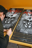 Andy Lutz signing posters