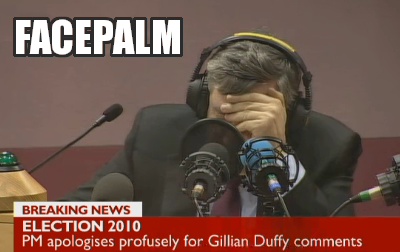 Gordon Brown hears his own words on tape and covers his face