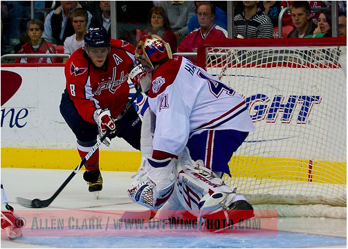 Alex Ovechkin closes in on Jaroslav Halak.