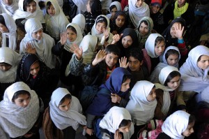 Students from local schools in Kandahar City visit the Afghan Expeditionary Air Group at Kandahar Airfield, Afghanistan, Dec. 31, 2009.