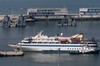 The Mavi Marmara ship, aboard which Israel's deadly raid on a Gaza-bound flotilla took place on May 31, 2010, leaves the Haifa port, northern Israel, on its way to Turkey, Thursday, Aug. 5, 2010.