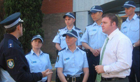 McLeay talks to some police. And no this isn't a caption contest.