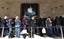 People queue up outside Apple's flagship store in the Carrousel du Louvre shopping center in the museum complex in Paris, Friday May 28, 2010. Apple Inc. launched the iPad in nine countries on Friday _ Australia, Canada, France, Germany, Italy, Japan, Spain, Switzerland and Britain, and shoppers queued in the hopes of getting the hand-held computer.