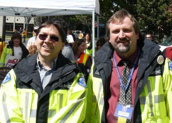 Mark Hancock, Secretary Treasurer of CUPE BC with Paramedic striker.