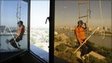 A window cleaner hangs on a rope ladder in central Baghdad.