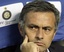 Inter coach Jose Mourinho, of Portugal, sits on the bench during an Italian first division soccer match between Inter Milan and Lecce at the San Siro stadium in Milan