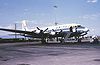 A Douglas DC-6 painted in blue and white United Airlines livery. The DC-6 is powered by four propeller engines.