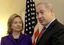 U.S. Secretary of State Hillary Rodham Clinton, left, listens as Israeli Prime Minister Benjamin Netanyahu speaks to reporters during a meeting in New York, Thursday, Nov. 11, 2010.