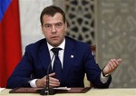 Russian President Dmitry Medvedev speaks during a joint press conference with Syrian President Bashar Assad, at the presidential palace, in Damascus, Syria, on Tuesday May 11, 2010.