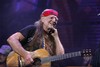  Willie Nelson performs at Farm Aid on Randalls Island Sunday, Sept. 9, 2007 in New York. nf2 