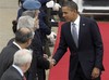 U.S. President Barack Obama, right, shakes hands with Portuguese Foreign Minister Luis Amado as he arrives for a NATO summit in Lisbon on Friday, Nov. 19, 2010. U.S. President Barack Obama and the leaders of NATO's 27 other member nations will open a two-day summit Friday aimed at finding ways to keep the Cold War alliance relevant in the 21st century with revamped roles including ballistic missile defense, anti-piracy patrols, and counterterrorism.