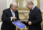 Russian Prime Minister Vladimir Putin, right, and FIFA President Sepp Blatter seen during their meeting in Moscow, Thursday, Oct. 15, 2009.