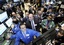 Traders work on the floor of the New York Stock Exchange, Tuesday, Feb. 10, 2009.