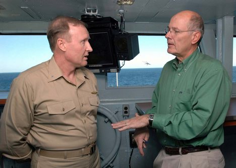 CBS News anchor Harry Smith converses with RADM Frank Pandolfe.