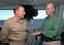 CBS News anchor Harry Smith converses with RADM Frank Pandolfe.