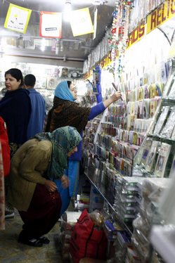 Kashmiri Muslim purchase eid cards ahead of the Eid al-Adha festival in Srinagar, the summer capital of Indian Kashmir, 08, December, 2008