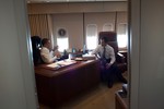 resident Barack Obama meets with Rep. Dennis Kucinich, D-Ohio, aboard Air Force One en route to Cleveland, Ohio, March 15, 2010. (Official White House Photo by Pete Souza)