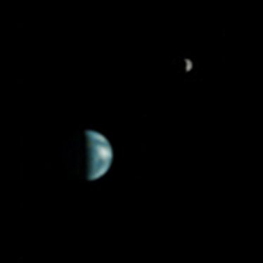 Earth and Moon from Mars, imaged by Mars Global Surveyor on May 8, 2003, 13:00 UTC. South America is visible