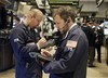 Traders work on the floor of the New York Stock Exchange Wednesday, April 28, 2010