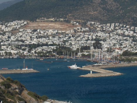 The port of Bodrum the harbour and the city; Bodrum, Turkey Bodrum (from Petronium), formerly Halicarnassus (Turkish: Halikarnas, Ancient Greek