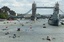 A series of 42 Captain's gig boats row up the Thames river past Tower Bridge as they re-enact the funeral of Britain's greatest naval hero, Admiral Horatio Nelson, during a ceremony in London, Friday, Sept. 16, 2005. The ceremony is part of a series of celebrations to mark the 200th anniversary of the Battle of Trafalgar.