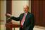 File - Karl Rove delivers remarks to the Summer 2004 White House Interns in the Dwight D. Eisenhower Executive Office Building, Aug. 3, 2004.