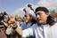 Convicted Bali bombers Imam Samudra, right, and Amrozi Nurhasyim, center, who are currently on death row, shout, 