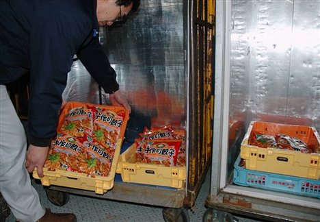 Chinese-made frozen dumplings which were removed from supermarkets are stored at a supermarket chain delivery center in Koshigaya near Tokyo, Jan. 30, 2008 following a news that ten Japanese were sickened after eating dumplings contaminated with insecticide Wednesday, Jan. 30, 2008. Three people in western Hyogo prefecture (state) and seven in Chiba near Tokyo suffered severe abdominal pains, vomiting and diarrhea after eating the frozen dumplings imported from China by a Japanese company, the H