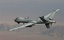 This undated handout photo provided by the U.S. Air Force shows a MQ-9 Reaper, armed with GBU-12 Paveway II laser guided munitions and AGM-114 Hellfire missiles, piloted by Col. Lex Turner during a combat mission over southern Afghanistan.