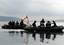 U.S. Navy divers assigned to the Naval Reserves (NR) Explosive Ordnance Disposal Mobile Unit One Seven (EOD-MU 17) transit Crescent Harbor near Naval Air Station Whidbey Island.