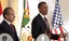 President Barack Obama, right, speaks during a meeting alongside Mexico's President Felipe Calderon, left, in Guadalajara, Mexico, Monday, Aug. 10, 2009. Obama huddled Monday with Calderon and Canada's Prime Minister Stephen Harper for a North American summit, where the swine flu epidemic and knotty disputes over cross-border trade dominated a lengthy agenda.