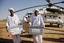 In El Lait, North Darfur, members of the Southern Sudan Referendum Commission (SSRC) unload voting materials delivered via helicopter by the African Union-United Nations Hybrid Operation in Darfur (UNAMID)