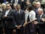 President Barack Obama bows his head at a memorial service in Tucson, Ariz., to honor the victims of a shooting rampage that that killed six people and left 14 injured, including Arizona Congresswoman Gabrielle Giffords, on the University of Arizona campus, Wednesday, Jan. 12, 2011.