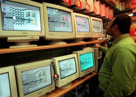 Computer monitors in a central London shop display the Microsoft Windows logo Tuesday, April 4, 2000. Microsoft Chairman Bill Gates is vowing to fight Monday's federal court decision that his company violated U.S. antitrust laws by mounting a 