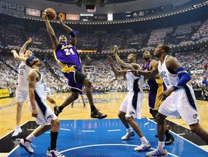 Los Angeles Lakers' Kobe Bryant (24) shoots in the first quarter of Game 5 of the NBA basketball finals against the Orlando Magic Sunday, June 14, 2009, in Orlando, Fla.