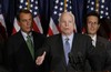 ** FILE ** This Wednesday, Feb. 13, 2008 file photo shows Republican presidential hopeful, Sen. John McCain, R-Ariz., center, flanked by House Minority Leader John Boehner of Ohio, left, and Rep. Eric Cantor, R-Va., during a news conference at the Capitol Hill Club in Washington.