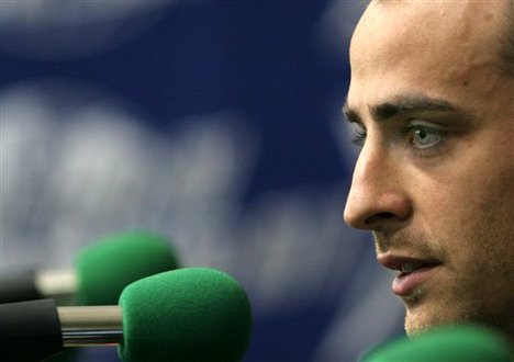 Bulgarian soccer international Dimitar Berbatov speaks during news conference in the Bulgarian capital Sofia, Thursday, May, 18, 2006. Berbatov signed for British Premiership Club Tottenham Hotspur for the 2006/07 season, after transfering from German team Bayer Leverkus